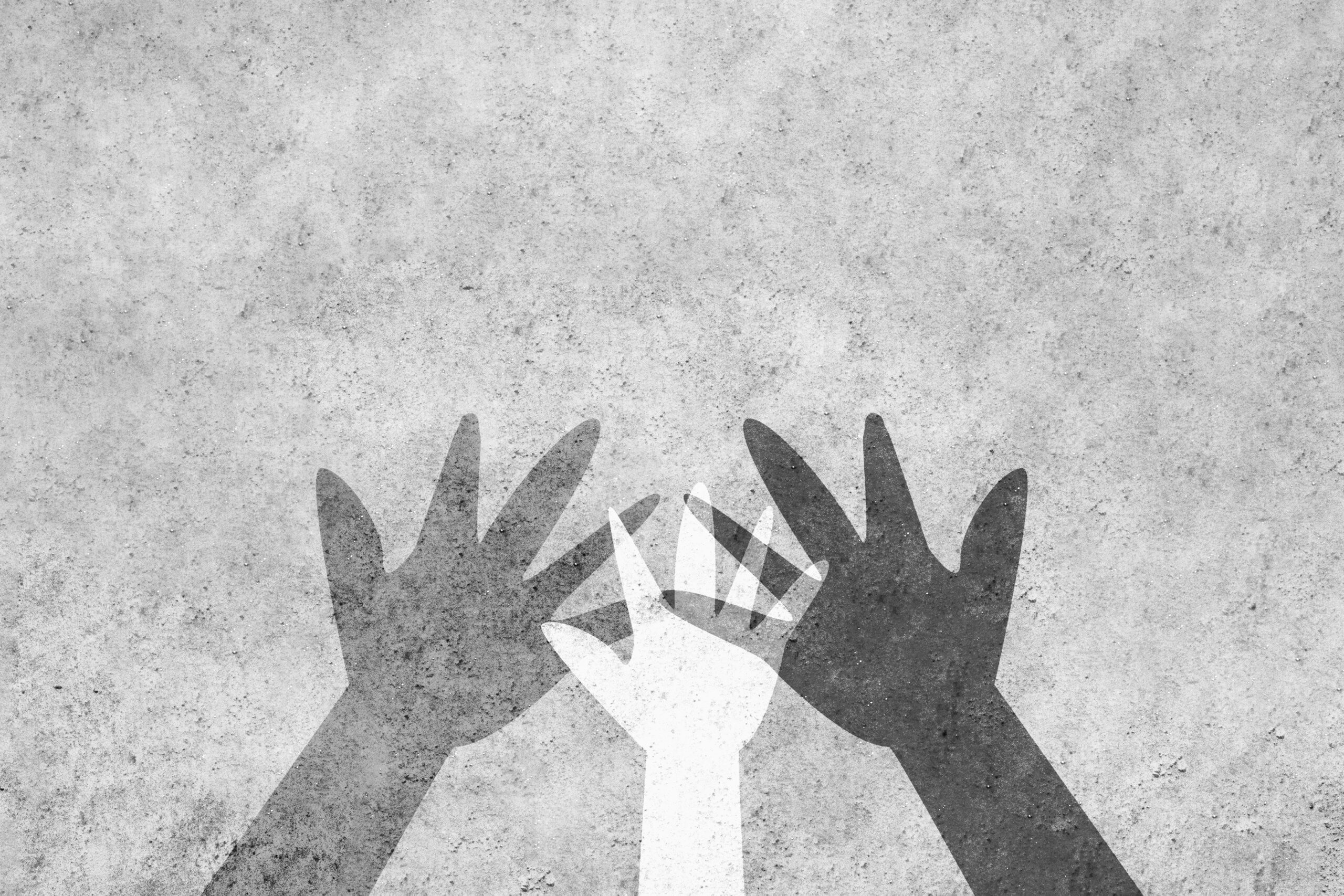 Hands of different colors unite against racism. Design with a powerful concept against racism with copy space.